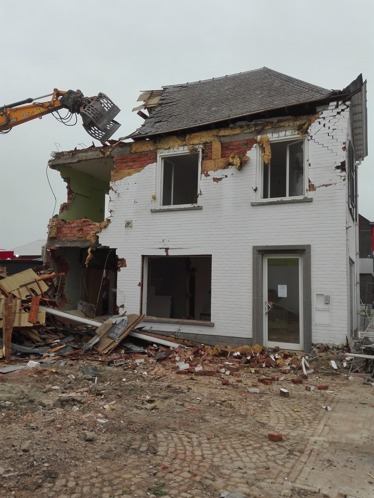 Afbraak oude apotheek en woonhuis